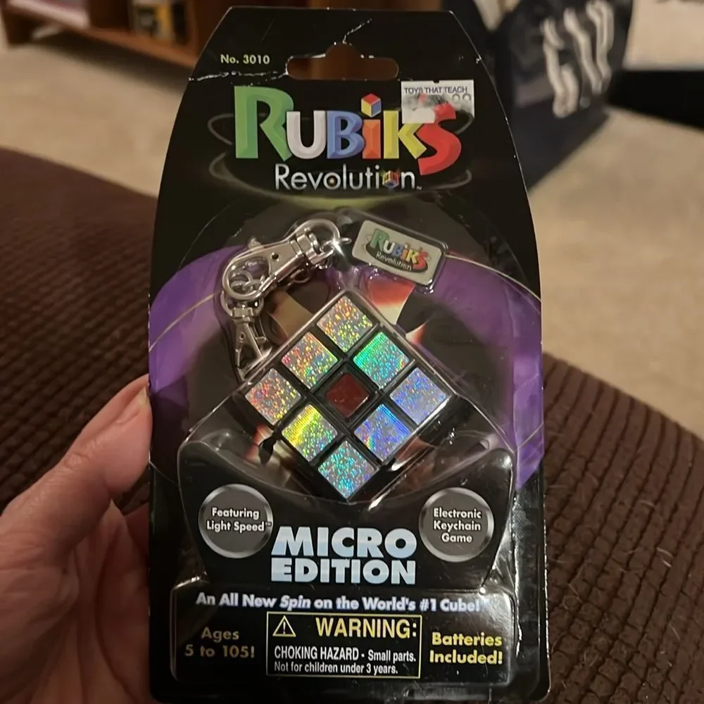 Brand new Rubiks Revolution electronic keychain game.